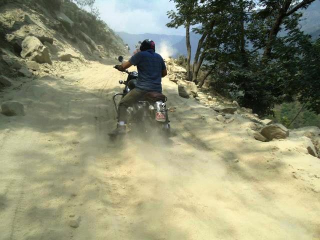 Royal Enfield Mustang road trip, paved road ends, Himalayas Nepal