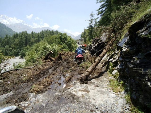 Slush and mud on Mustang trail, motorcycle challenge Nepal
