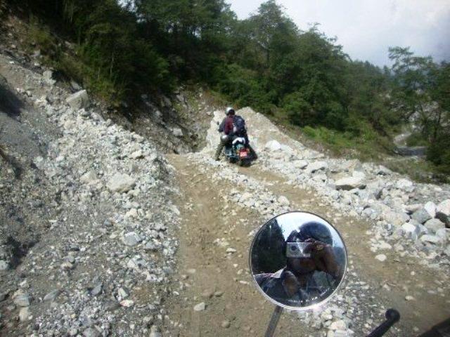 Leaving highway, starting Himalayan off-road motorcycle ride