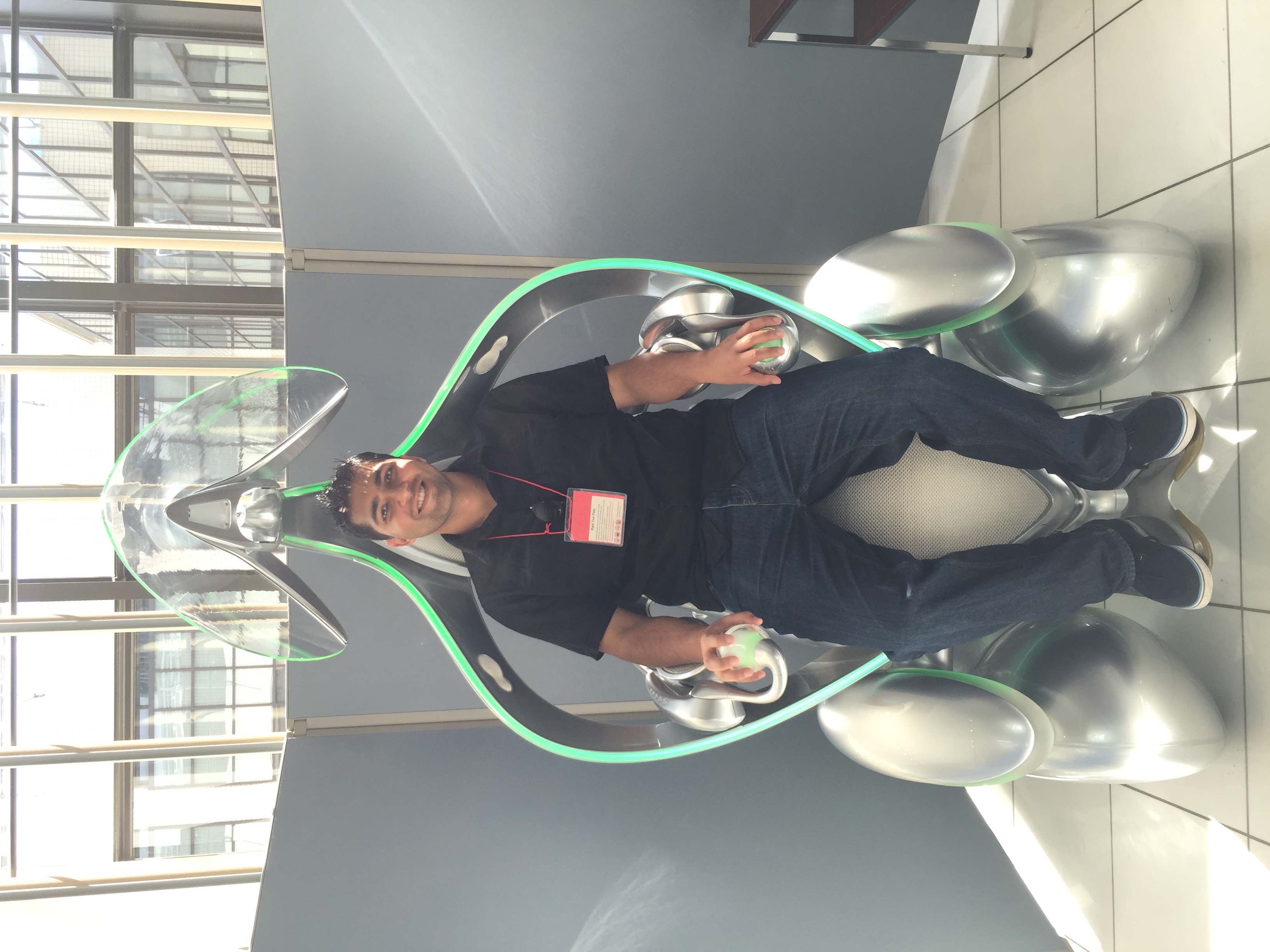 Sitting inside a future mobility pod at Toyota Museum