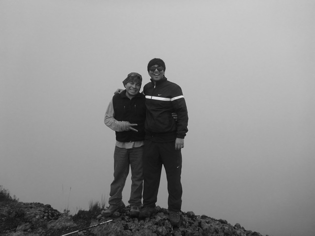 Summit of Pasochoa (4,199 m) with Cotopaxi in the distance